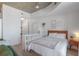 Bright bedroom featuring modern closet and storage space, concrete ceilings and natural light at 860 Peachtree Ne St # 1103, Atlanta, GA 30308