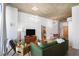 Cozy living room featuring comfortable seating, concrete ceilings and modern lighting fixtures at 860 Peachtree Ne St # 1103, Atlanta, GA 30308