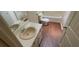 Bathroom featuring a single sink vanity, toilet, and tub/shower combination at 99 Fox Ridge Ct, Dallas, GA 30157