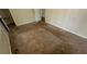 Bedroom featuring carpeted floors and closet door with natural light at 99 Fox Ridge Ct, Dallas, GA 30157