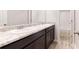 Bathroom with double vanity, granite countertops, and a large mirror reflecting the shower and toilet areas at 164 Weldon Rd, Mcdonough, GA 30253