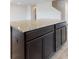 Granite kitchen island features plenty of cabinet space at 164 Weldon Rd, Mcdonough, GA 30253