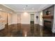 Finished basement boasting a stone fireplace, recessed lighting and polished concrete floors at 204 Maple Creek Chase, Woodstock, GA 30188