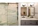 Modern bathroom with double sinks, marble shower and glass door at 204 Maple Creek Chase, Woodstock, GA 30188
