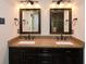 Bathroom vanity with double sinks, granite countertops, and large mirrors with decorative lighting at 204 Maple Creek Chase, Woodstock, GA 30188