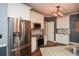 Charming kitchen with stainless steel appliances, granite counters, and white cabinetry at 204 Maple Creek Chase, Woodstock, GA 30188