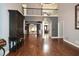 Spacious living room with hardwood floors and plenty of natural light at 204 Maple Creek Chase, Woodstock, GA 30188