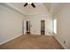 Spacious main bedroom featuring an ensuite bathroom and walk-in closet at 204 Maple Creek Chase, Woodstock, GA 30188