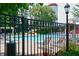 Well-maintained community pool with plenty of seating and shaded areas for relaxation at 204 Maple Creek Chase, Woodstock, GA 30188