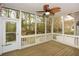 Spacious screened porch overlooking the lush backyard and green trees at 204 Maple Creek Chase, Woodstock, GA 30188