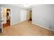 Bedroom with closet and views to other rooms in the house at 2533 Whispering Pines Dr, Grayson, GA 30017