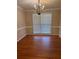 Elegant dining room with chandelier and large window at 2533 Whispering Pines Dr, Grayson, GA 30017