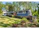 Well-maintained home with brick accents, lush landscaping, and a green lawn at 3325 N Embry Cir, Atlanta, GA 30341