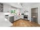 Modern kitchen with stainless steel appliances, white cabinetry, and quartz countertops at 3325 N Embry Cir, Atlanta, GA 30341