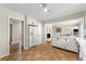 Spacious kitchen featuring white cabinetry, a peninsula, and an open floor plan at 3325 N Embry Cir, Atlanta, GA 30341