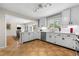 Bright, white kitchen featuring modern appliances, ample counter space, and an open layout at 3325 N Embry Cir, Atlanta, GA 30341