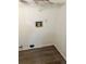 Empty laundry room with washer/dryer hookups and wire shelving at 3604 Hopkins Ct, Powder Springs, GA 30127