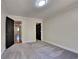 Bedroom featuring neutral walls, carpet, with black doors and white trim at 609 Millstone Dr, Jonesboro, GA 30238