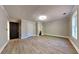 Spacious bedroom featuring hard wood floors, neutral paint and white trim at 609 Millstone Dr, Jonesboro, GA 30238