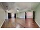 Large primary bedroom featuring vaulted ceilings, hardwood floors, and multiple closets at 609 Millstone Dr, Jonesboro, GA 30238
