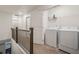 Convenient laundry area with washer and dryer hookups located upstairs, offering practicality and ease at 6415 Shalks Crossing Dr, Lithonia, GA 30058