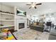 Spacious living area with fireplace, open to kitchen and dining at 6415 Shalks Crossing Dr, Lithonia, GA 30058