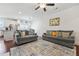 Comfortable living room open to kitchen, featuring hardwood floors and ample space at 6415 Shalks Crossing Dr, Lithonia, GA 30058