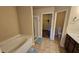 Bathroom features a combined shower and tub with tile flooring at 3084 Turman Cir, Decatur, GA 30033