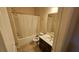 Bathroom with tub-shower combo, neutral-toned walls, and tile flooring at 3084 Turman Cir, Decatur, GA 30033