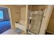 Bright bathroom featuring a soaking tub and a glass-enclosed shower, offering a luxurious bathing experience at 3084 Turman Cir, Decatur, GA 30033