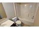 Bathroom featuring a tub and shower combination, a toilet, and a vanity with a sink at 3084 Turman Cir, Decatur, GA 30033
