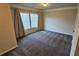 Bedroom with neutral carpet, crown moulding, and large windows at 3084 Turman Cir, Decatur, GA 30033