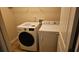 Laundry room with white washer and dryer at 3084 Turman Cir, Decatur, GA 30033