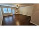 Bright living room featuring hardwood floors and a ceiling fan at 3084 Turman Cir, Decatur, GA 30033