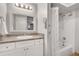 Bright bathroom with shower/tub, large mirror, and vanity with storage at 3085 Colonial Way # L, Atlanta, GA 30341