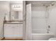 Well-lit bathroom featuring a shower/tub combination and vanity with countertop space at 3085 Colonial Way # L, Atlanta, GA 30341
