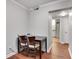 Charming dining area with wood floors and easy access to the bathroom at 3085 Colonial Way # L, Atlanta, GA 30341