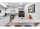 Well-lit kitchen with stainless steel appliances, ample counter space, and stylish decor at 3085 Colonial Way # L, Atlanta, GA 30341