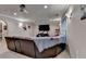 Finished basement with plush carpeting, recessed lights, large sectional sofa, and projector at 320 Hillside Manor Dr, Sugar Hill, GA 30518