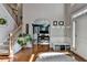 Elegant foyer with a staircase, high ceilings, hardwood floors, and natural light at 320 Hillside Manor Dr, Sugar Hill, GA 30518