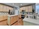 Well-appointed kitchen featuring stainless steel appliances, ample cabinet space, and a convenient center island at 320 Hillside Manor Dr, Sugar Hill, GA 30518