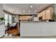 Spacious kitchen featuring ample cabinet space, stainless steel appliances, and a cozy breakfast nook at 320 Hillside Manor Dr, Sugar Hill, GA 30518