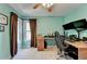 Bright office with modern monitors, a comfortable chair, and natural light at 320 Hillside Manor Dr, Sugar Hill, GA 30518