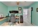 Bright office with modern monitors, a comfortable chair, and natural light at 320 Hillside Manor Dr, Sugar Hill, GA 30518