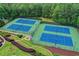Overhead shot of tennis courts with surrounding trees, benches, and landscaping creating a great community amenity at 320 Hillside Manor Dr, Sugar Hill, GA 30518