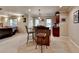 Finished basement wet bar featuring a counter, barstool seating, sink, and cabinets for storage and entertaining at 320 Hillside Manor Dr, Sugar Hill, GA 30518