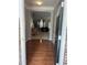 Inviting foyer with gleaming hardwood floors and an open view to the living area at 4036 Carlinswood Way, Stone Mountain, GA 30083