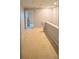 Hallway with carpet flooring leading to other rooms in the house at 4036 Carlinswood Way, Stone Mountain, GA 30083