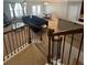 View from the stairs of the open concept living and dining space at 4036 Carlinswood Way, Stone Mountain, GA 30083