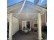 Covered patio with seating, perfect for outdoor entertaining at 4036 Carlinswood Way, Stone Mountain, GA 30083